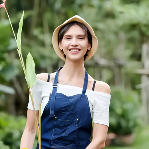 garden-worker-carrying-flower-pot_274689-8493.webp